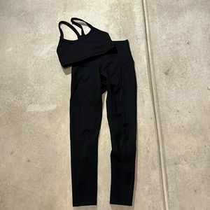 Morgan Stewart black sports bra and leggings set